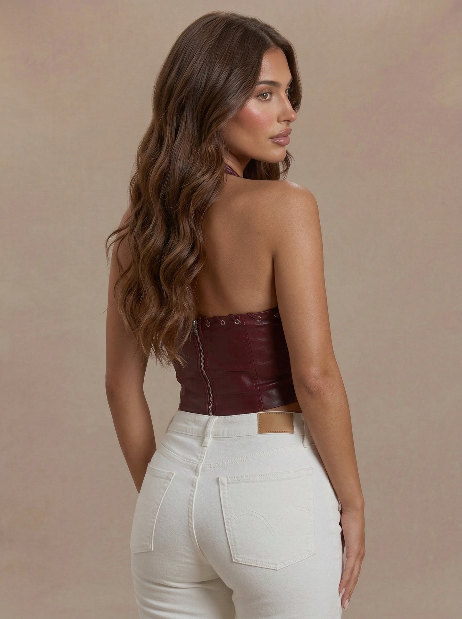 back_view__burgundy_leather_corset__white_jeans.png