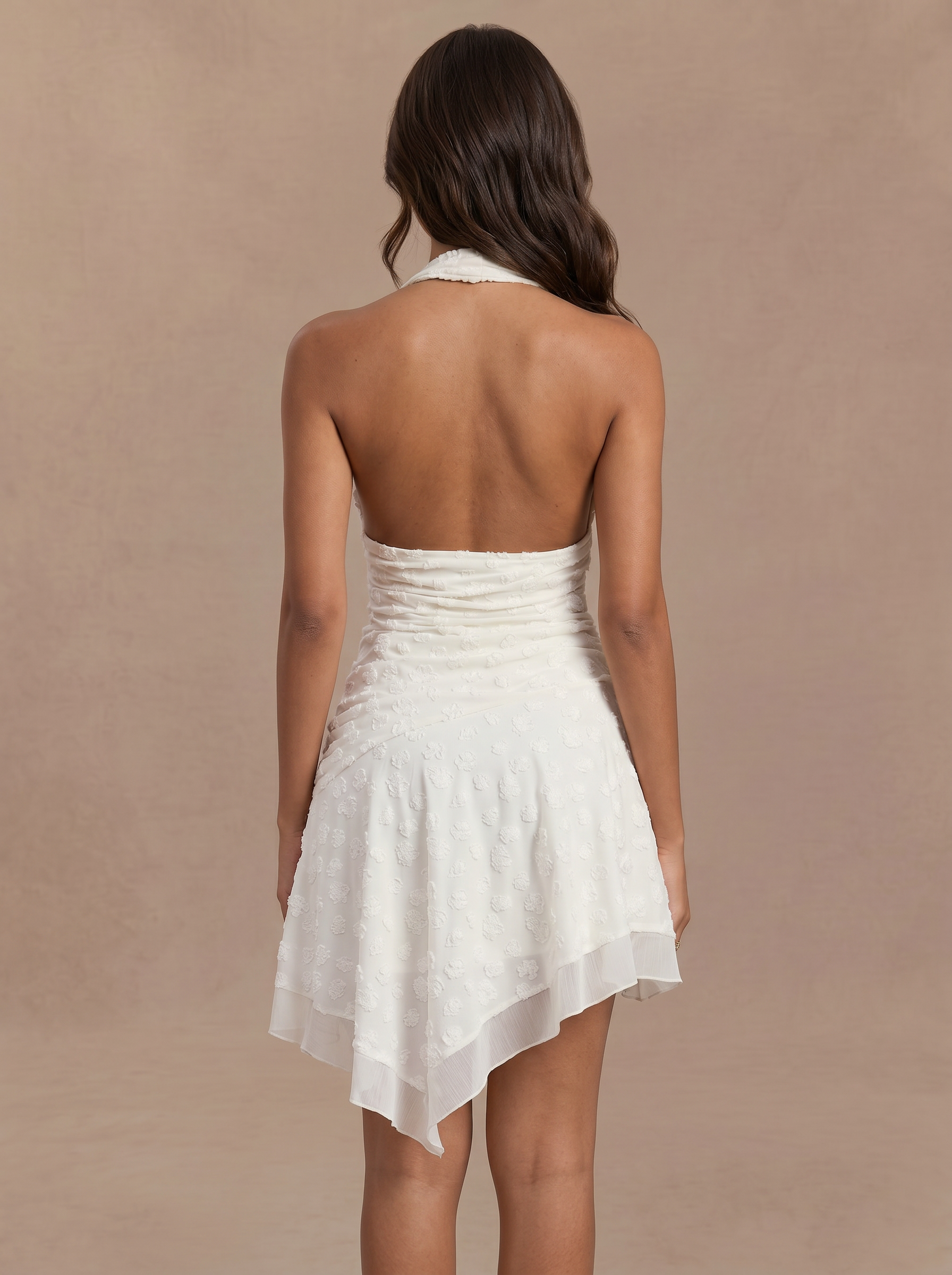 back_view_woman_in_white_mini_dress_2.png