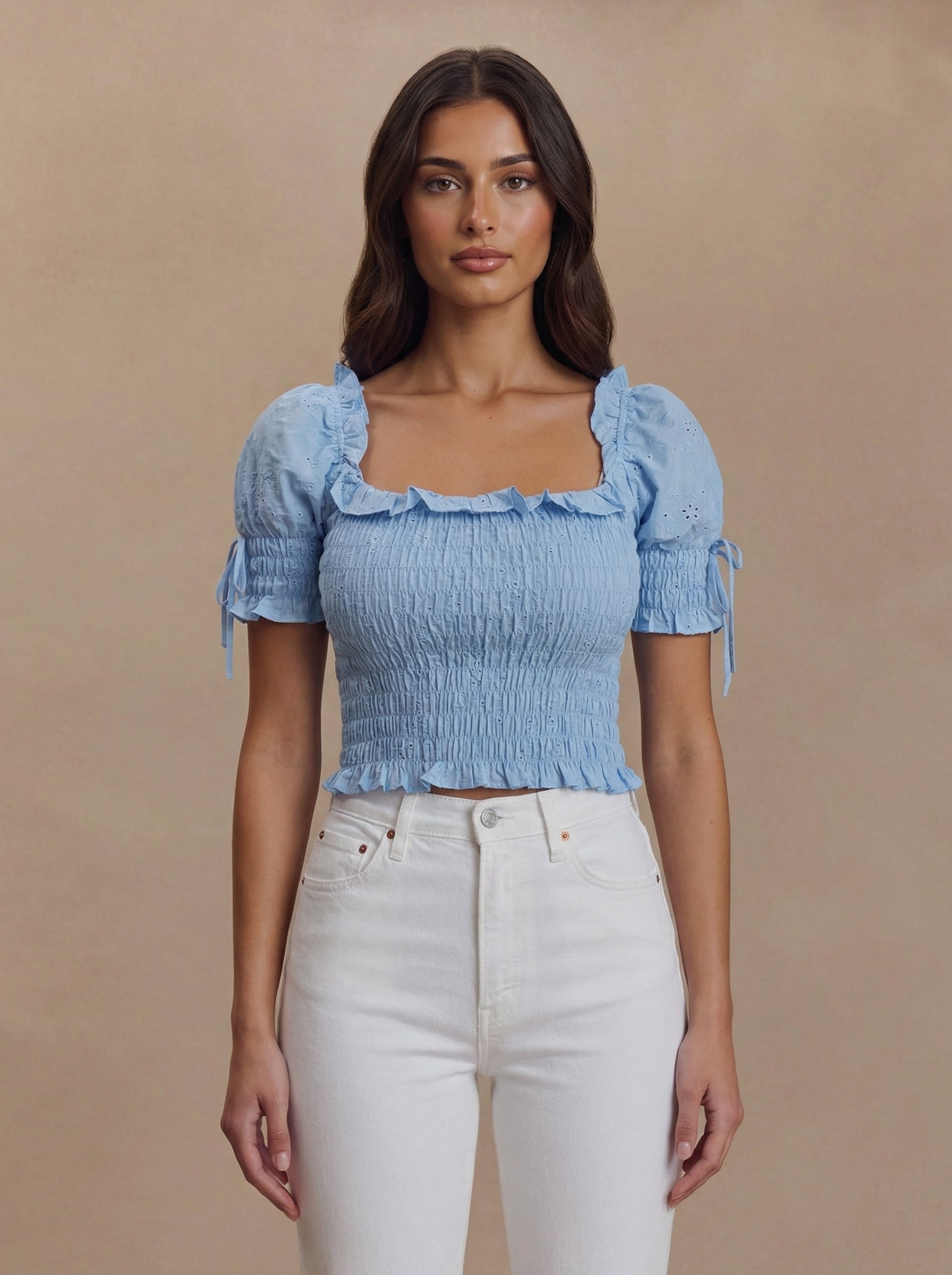 blue_smocked_puff-sleeve_top__white_jeans__studio_pose.jpg