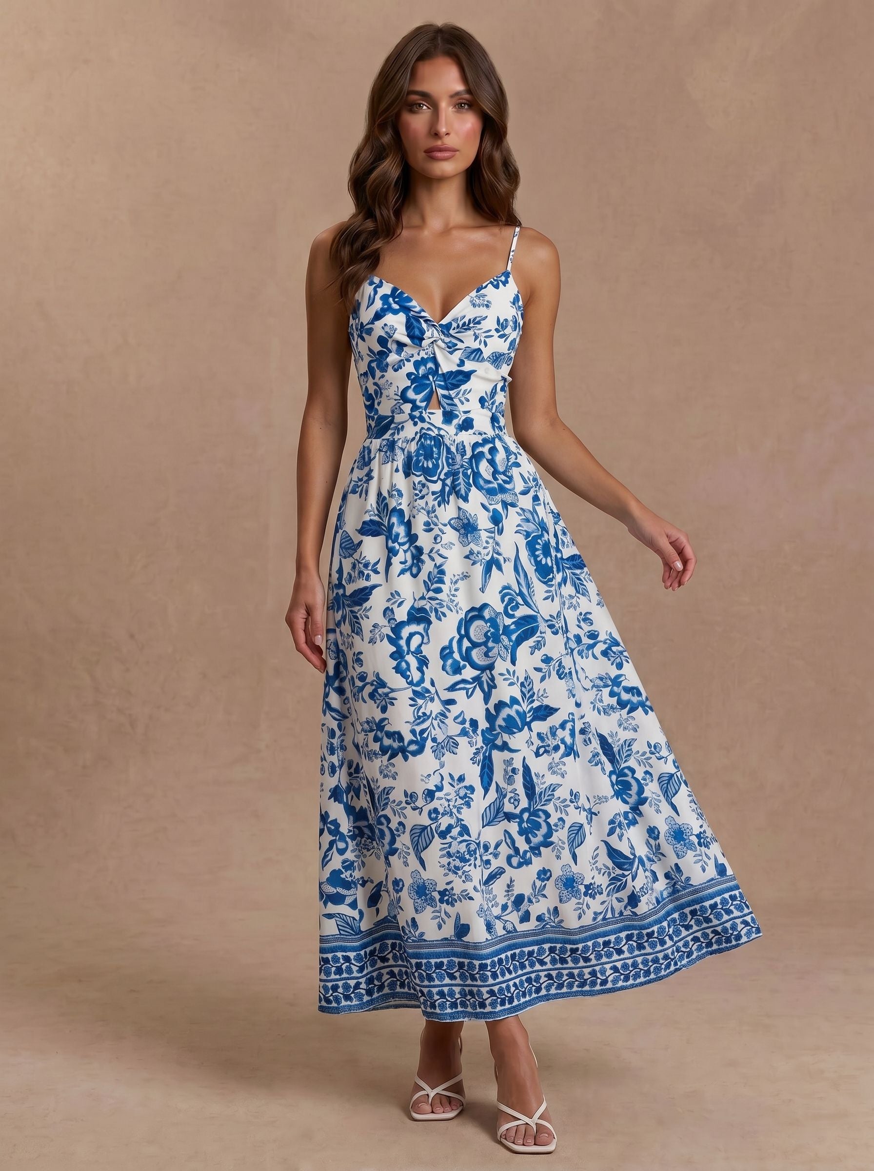 elegant_woman_in_blue_floral_dress.jpg