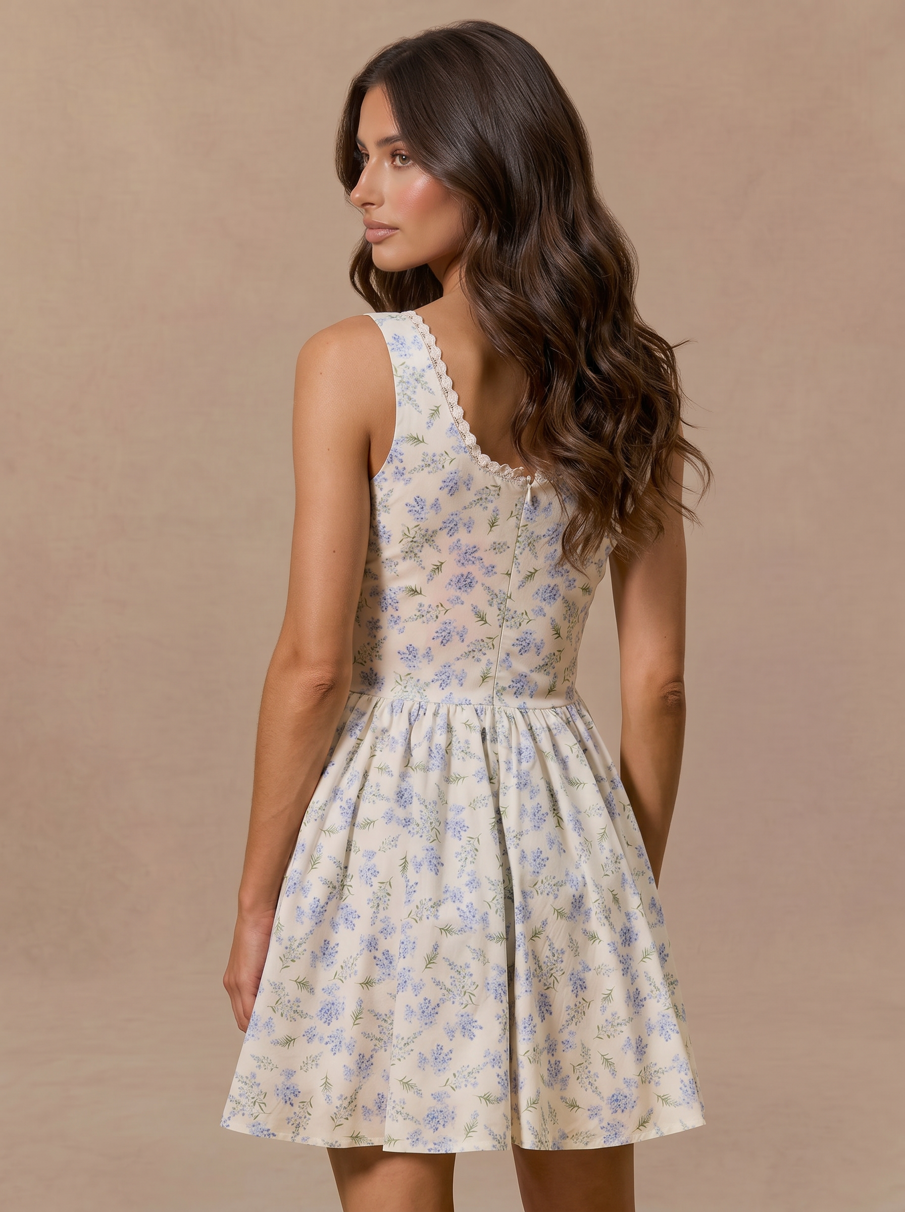 model_from_behind_in_floral_mini_dress.png